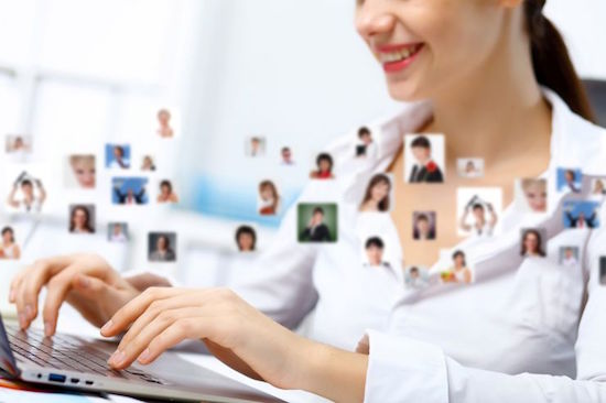 A woman is sitting ng at a desk, trying on a computer.  There are also a number of thumbnail citrus of various pipes superimposed on the picture. 