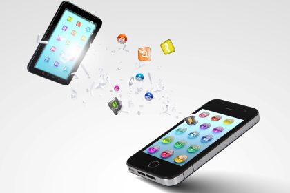 2 Cell Phones with data apps showing