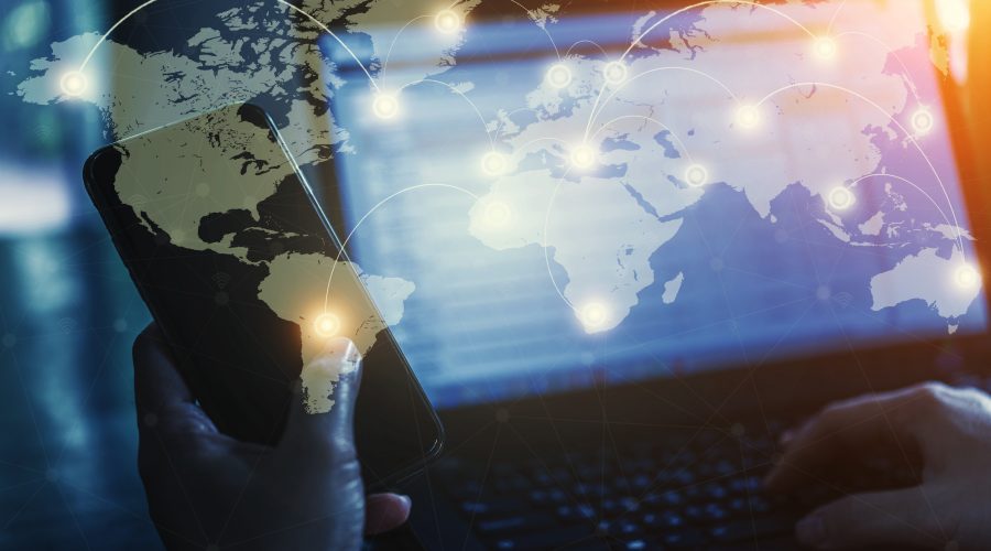 Pros and Cons of AI in Coaching A digital image of parts of the world with data flowing