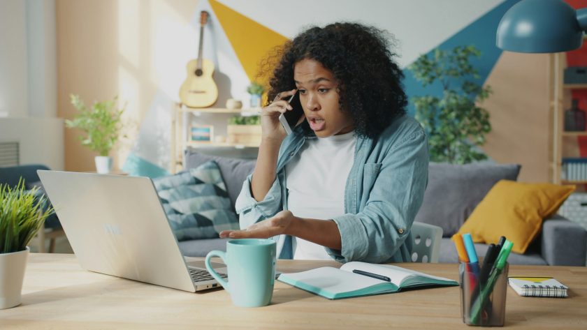 When a Client Feels Like They Are in a Hot Seat A African American woman is sitting and looks upset or frustrated
